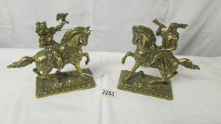A polished brass American Indian on horse and a nobleman with hawk on horse.
