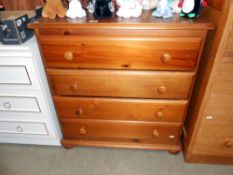 A solid pine 4 drawer chest of drawers 82cm x 43cm x height 85cm