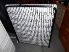 A single 80cm wide metal framed folding put me up bed