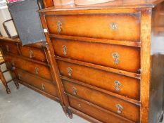 A mid 20th century dressing table with matching 5 drawer chest.