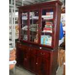 A good glazed top bookcase.