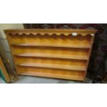 A set of pine wall shelves.