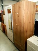A pine effect 2 door 2 drawer wardrobe height 181cm x 67cm x 51cm
