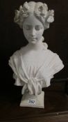A classical style female bust.