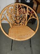 A cane garden chair.