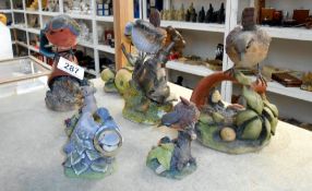 A quantity of Arden sculptures resin bird ornaments also including a mouse sculpture