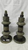 A pair of large Indian brass and wooden table lamps (will need rewiring).