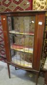 An Edwardian lead glazed mahogany inlaid display cabinet, (2 glass panels missing on bottom right.