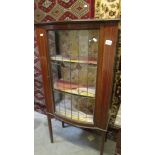 An Edwardian lead glazed mahogany inlaid display cabinet, (2 glass panels missing on bottom right.