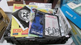 A mixed lot of Beatles related tapes, books, magazines etc.