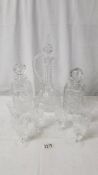 2 heavy square cut glass decanters, a cut glass claret jug and a set of 6 glasses.