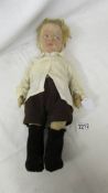 A vintage felt boy doll, 42 cm.
