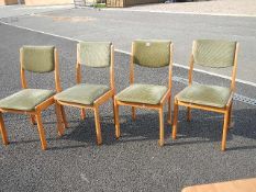 A set of 4 green draylon pine chairs