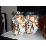 A pair of pottery elephant plant stands,