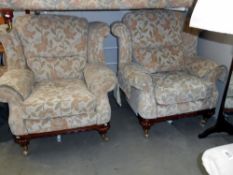 2 floral arm chairs