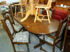 An old charm oak extending table and 6 chairs
