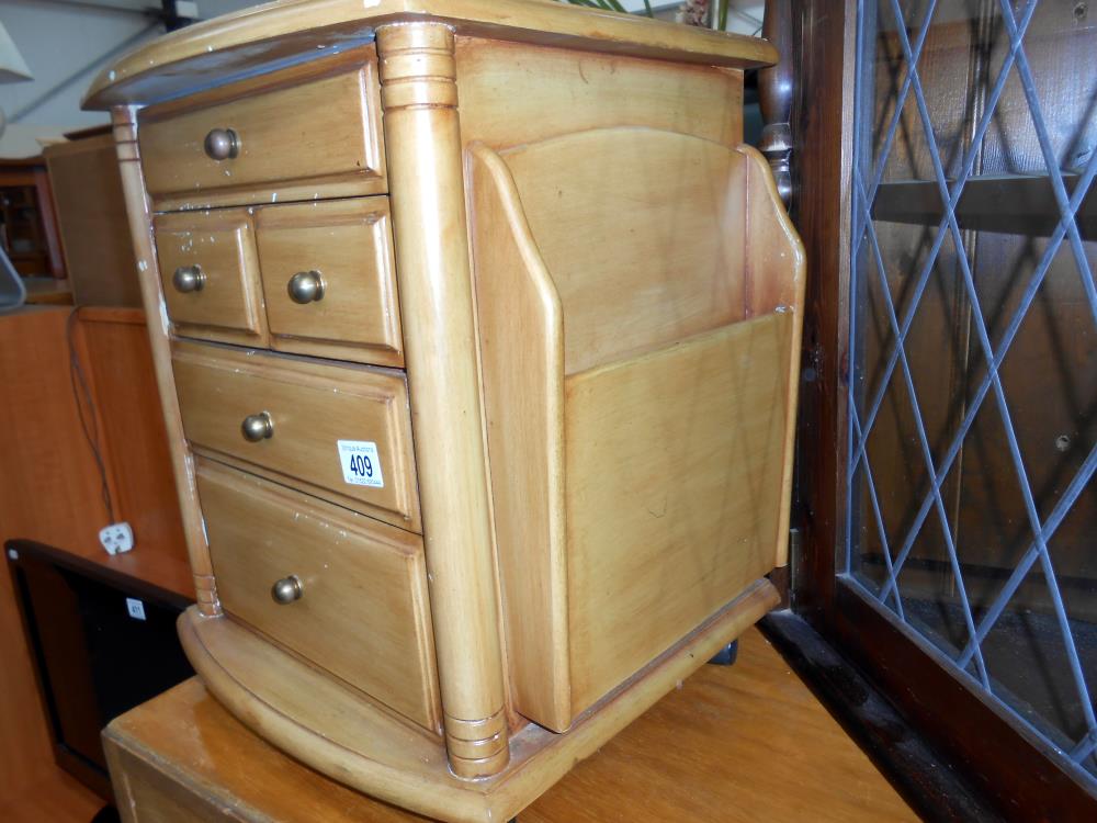 A small mid coloured wooden chest of drawers with magazine racks on sides 42cm x 36cm x height 47cm - Image 2 of 3