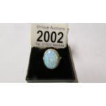 A large 9ct gold reconstituted opal ring, size M half, approximate total weight 3.7 grams.