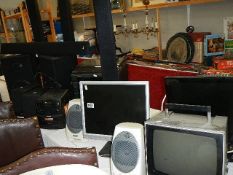 A set of 4 LG suround sound speakers (one missing base), a Bush music centre,