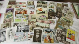 Approximately 50 assorted postcards including humorous.