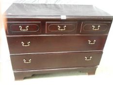 A three drawer chest.