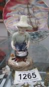 A Royal Doulton figurine 'The River Boy' HN2128.