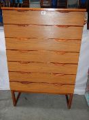 A good 7 drawer teak chest by Europa Furniture
