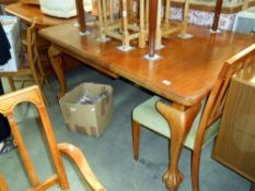 A Victorian/Edwardian mahogany extending dining table on ball and claw feet 149cm x 105cm extended,