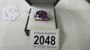 A 9ct white gold amethyst and diamond ring, size R.