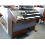 A Hammond organ with internal speakers