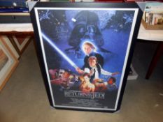 A framed and glazed Star Wars Return of the Jedi poster signed Dave Prouse (Darth Vader),