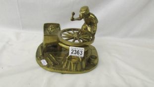 A brass diorama - Wheelwright.