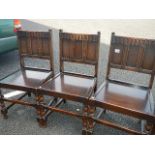 A good set of 4 oak hard seated chairs (including 1 carver)