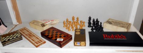 A quantity of vintage chess, draughts, dominoes etc.