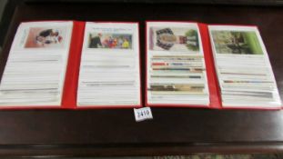 2 albums of postcards including Donald McGilly, Lawson Wood etc.