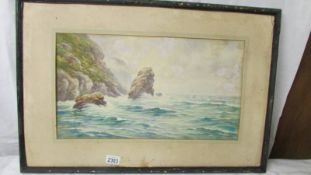 An Arthur Dean (1880) water colour coastal scene with rocks and seagulls, framed but no glass.