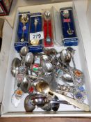 In excess of 30 assorted souvenir spoons
