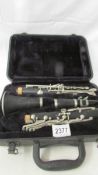 A cased Blessing clarinet.
