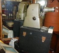 An Aldis projector and other photographic equipment.