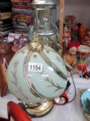 A pair of brass table lamps with glass shades etc.