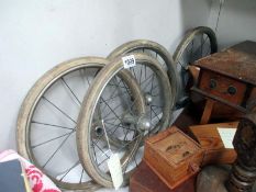 A set of 4 old pram wheels