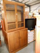 A 1950's oak bookcase/dresser cupboard base and glazed top, base 94cm x 46cm x height 92cm,