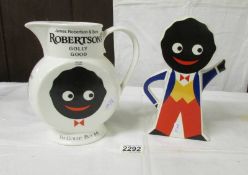 A Robertson's jam jug and a Robertson's Golly teapot.