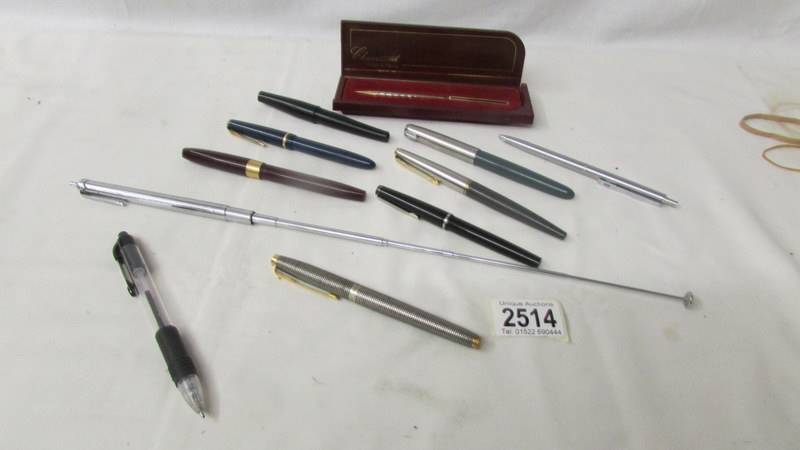 A mixed lot of old pens etc., including a Parker fountain pen marked Sterling 925 France.
