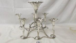 A superb quality silver plate epergne with central trumpet and 6 smaller surrounding trumpets.