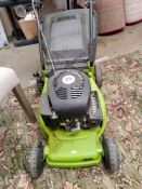 A Performance petrol lawnmower with grass collector