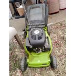 A Performance petrol lawnmower with grass collector