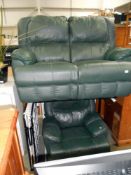 A green leather 2 seater recliner settee and a chair,