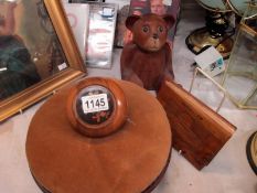 A wooden teddy bear and other wooden items