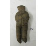 An old cloth 'soldier' doll (some small tears), 29 cm.